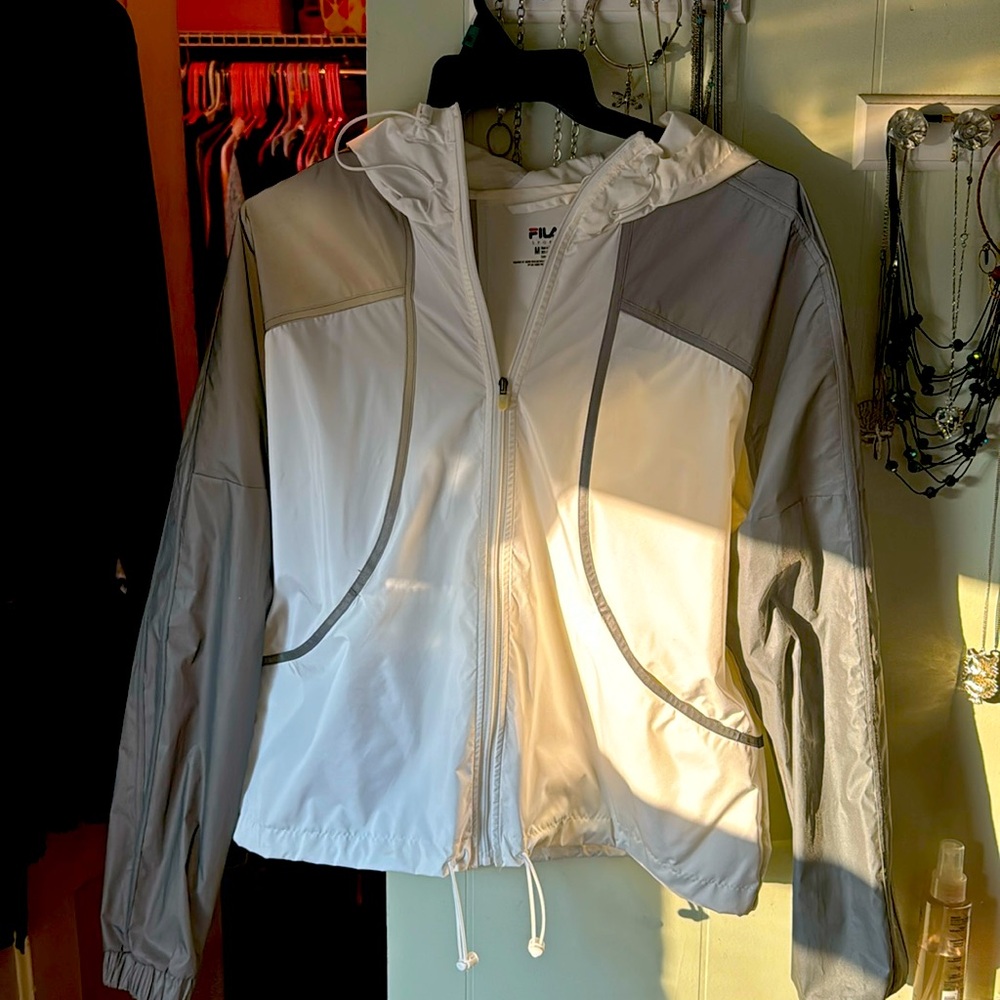 Fila white and grey windbreaker. Never used. No tags